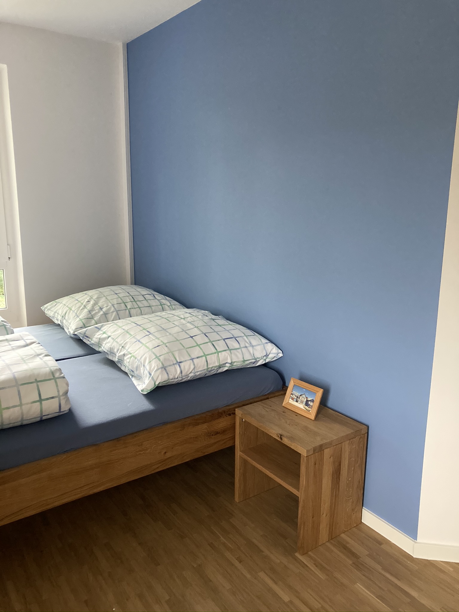 Schlafzimmer der Gastdozierendenwohnung